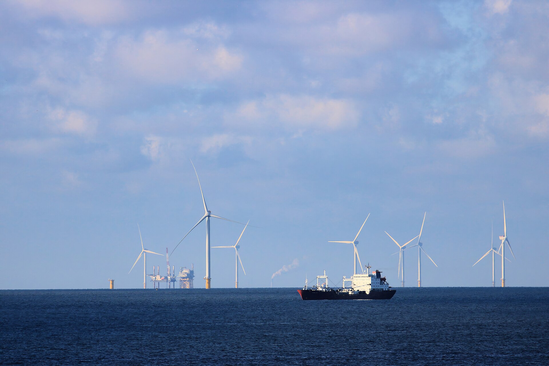 A large oil tanker sailing on open water, photographed from the side.