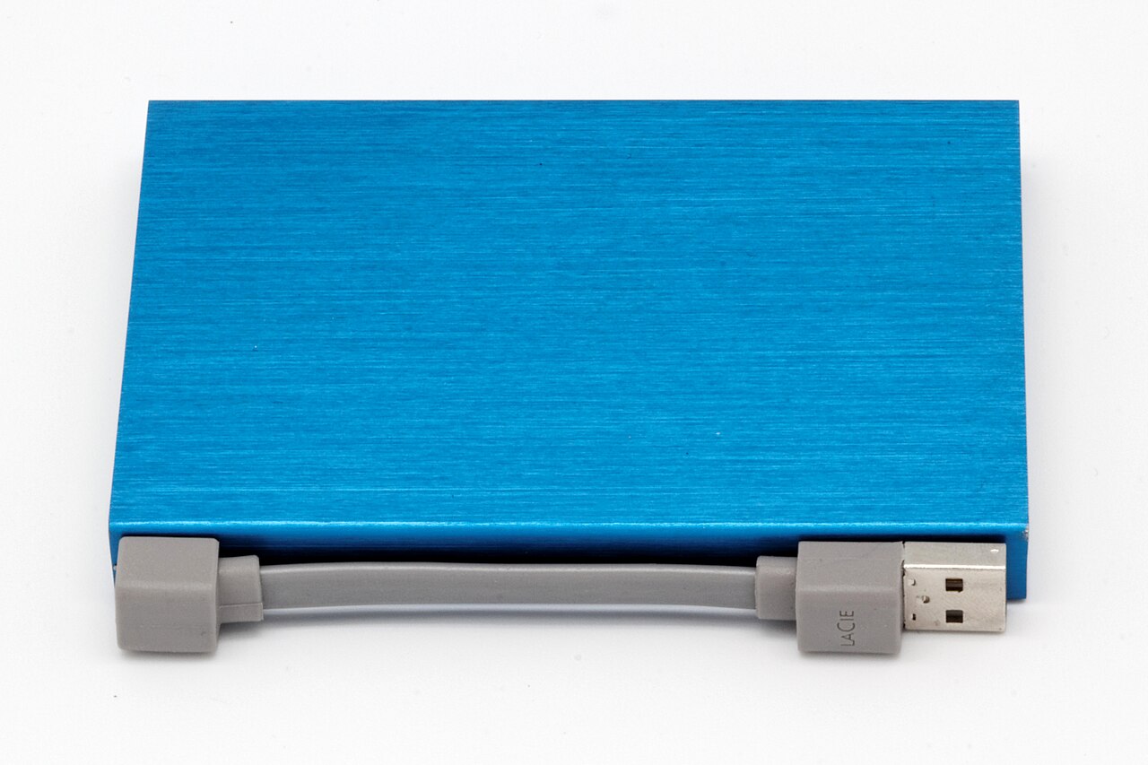 A blue LaCie external hard drive and its USB cable on a white background.
