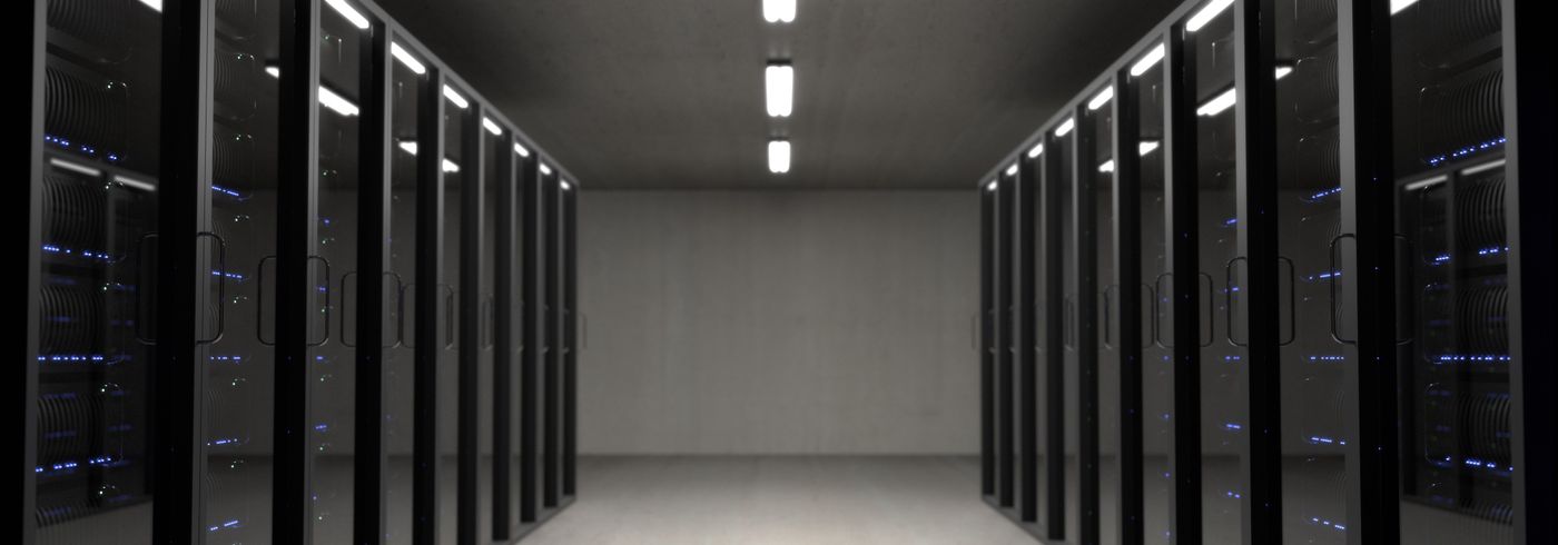 Close-up of illuminated server racks in a data center