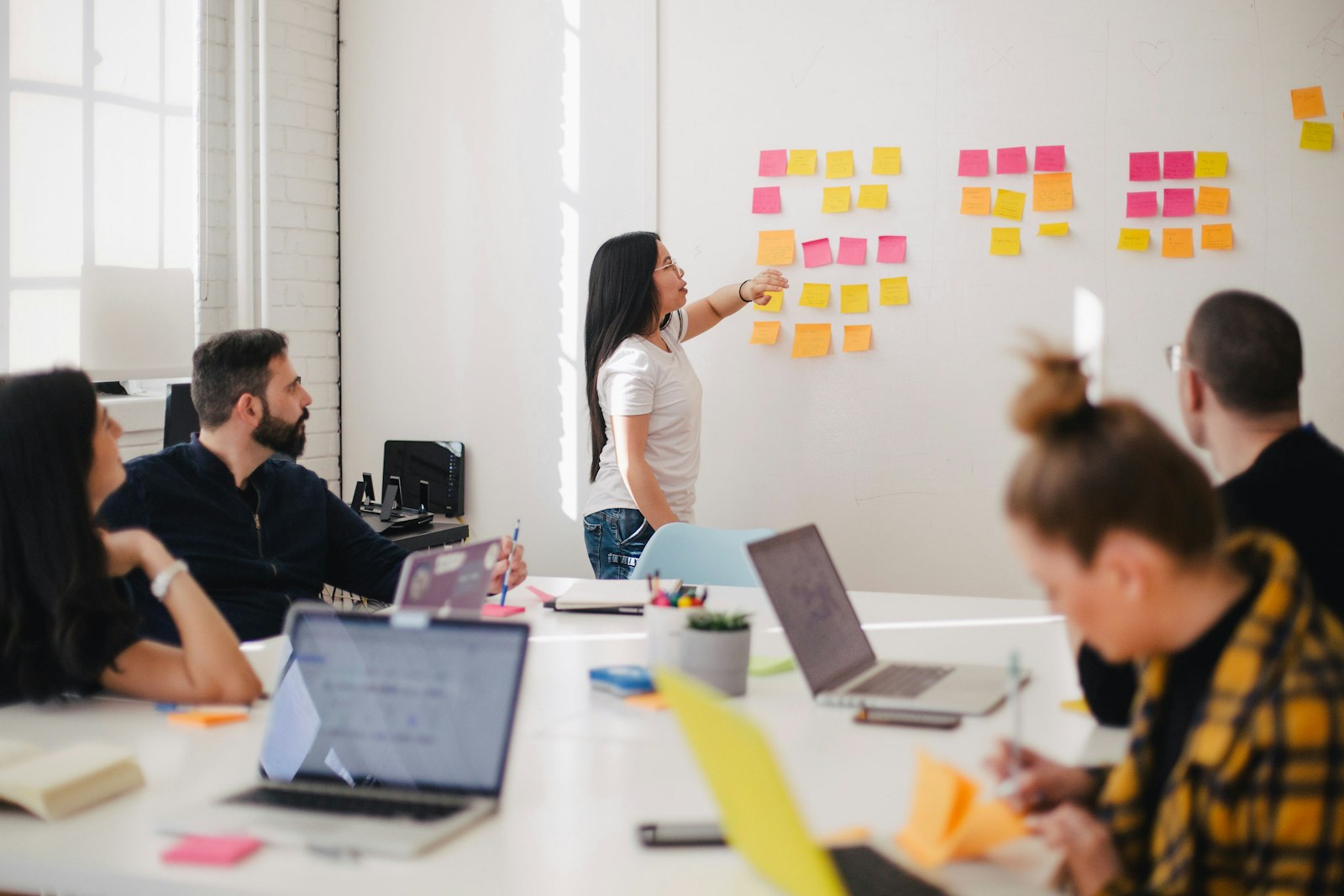 Team of professionals collaborating around a conference table