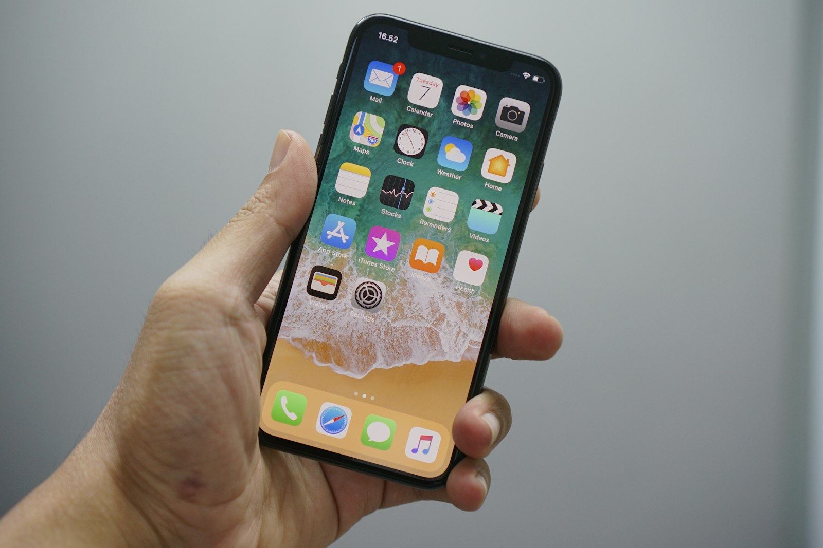 Black smartphone lying face-up on a surface