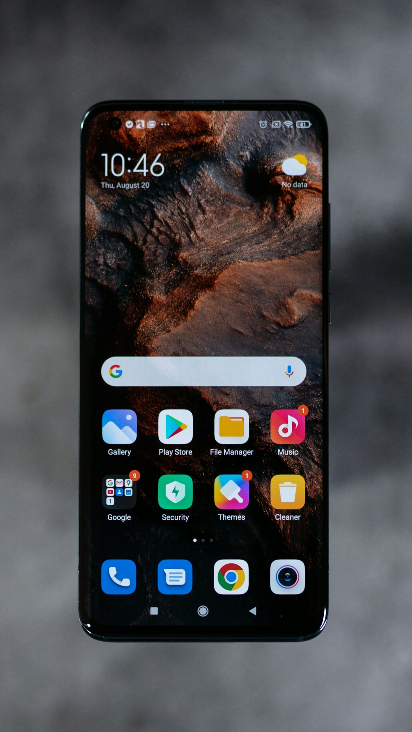 Several smartphones arranged on a table