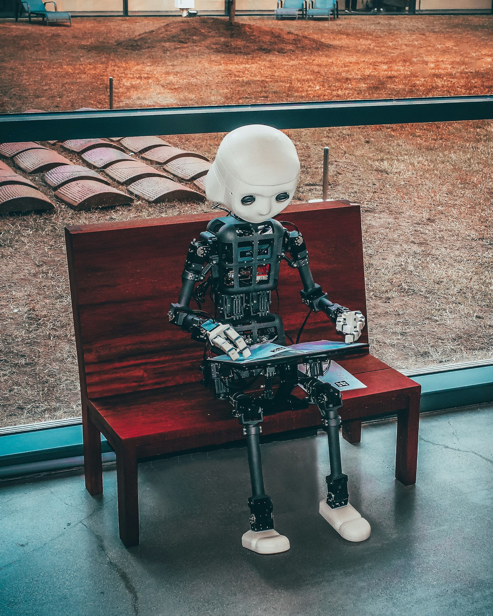 Humanoid robot face with illuminated sensors