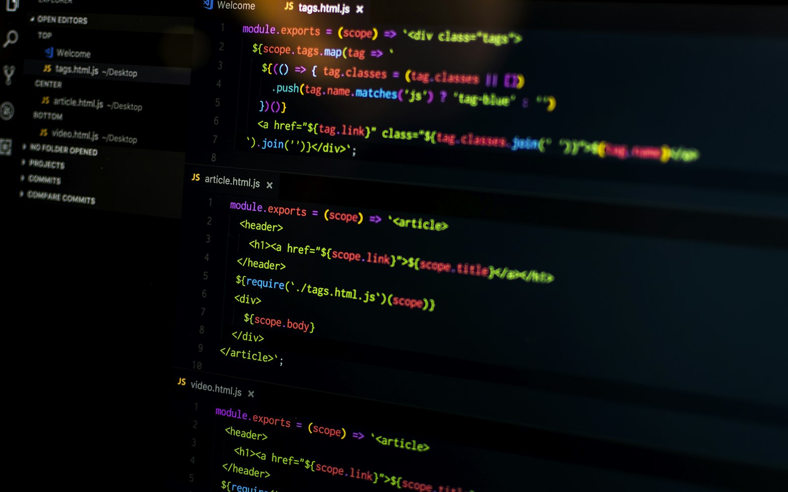 Close-up of colorful source code on a monitor