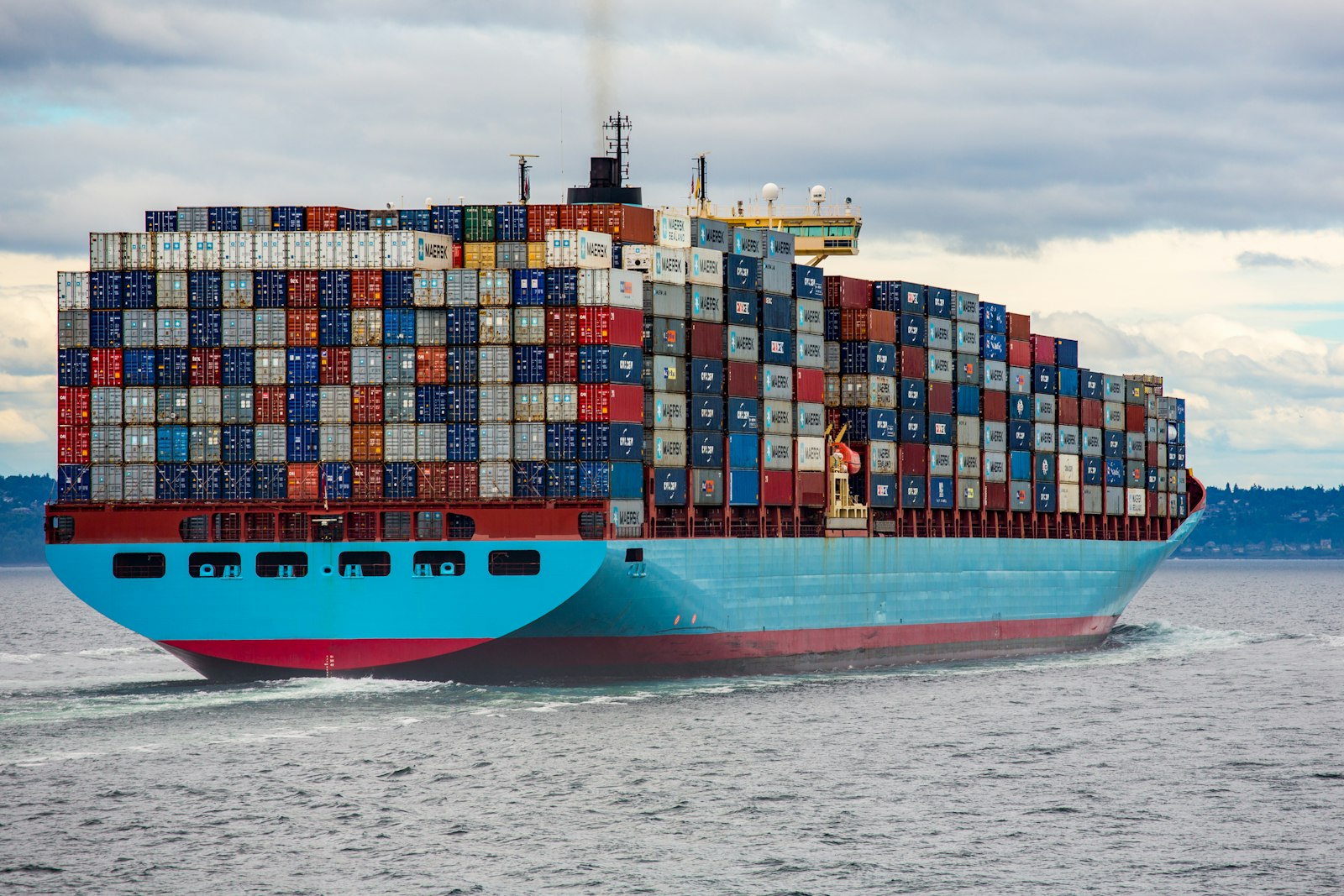 Large cargo ship sailing on open ocean waters
