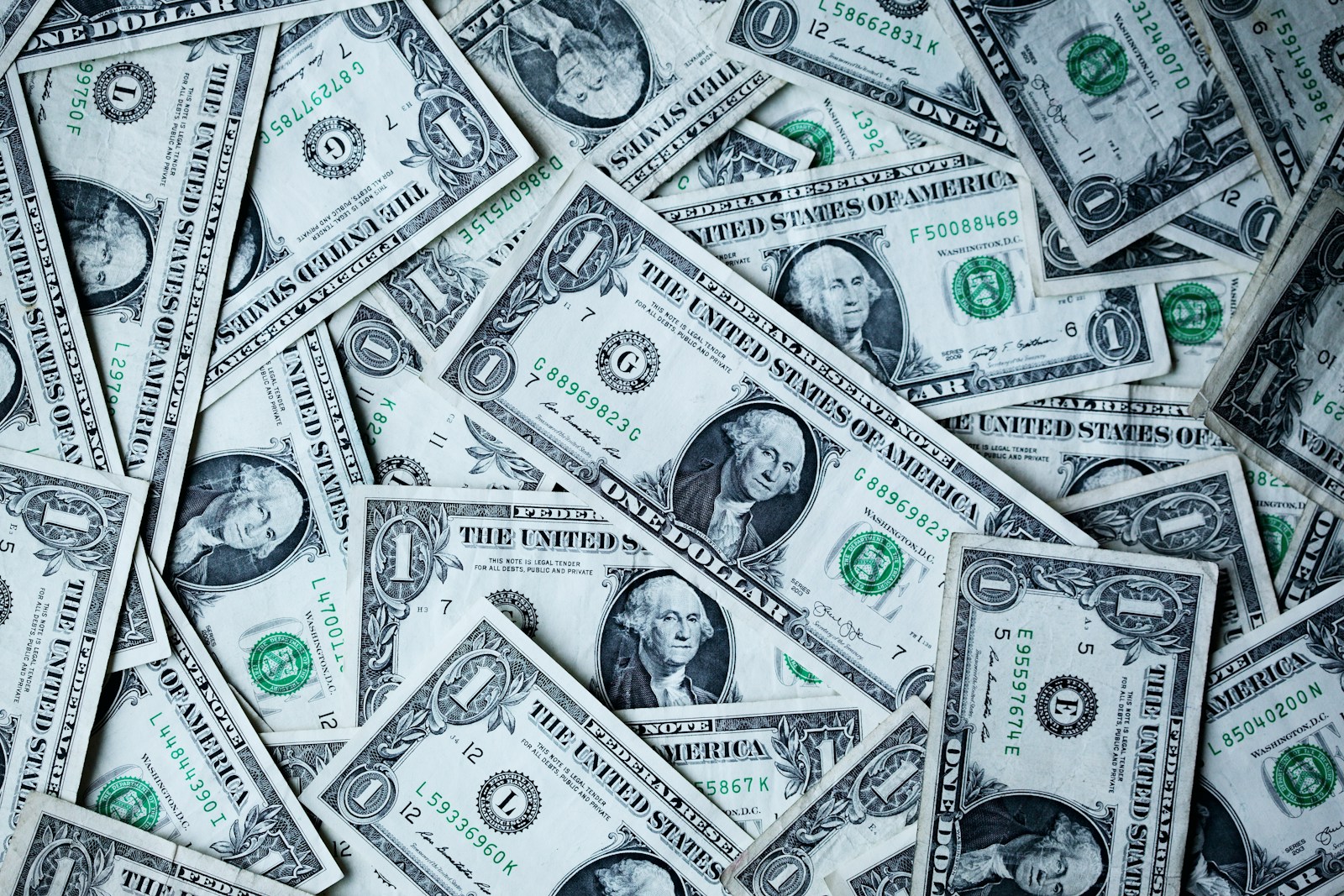 Close-up pile of US one-dollar bills representing payments and settlement