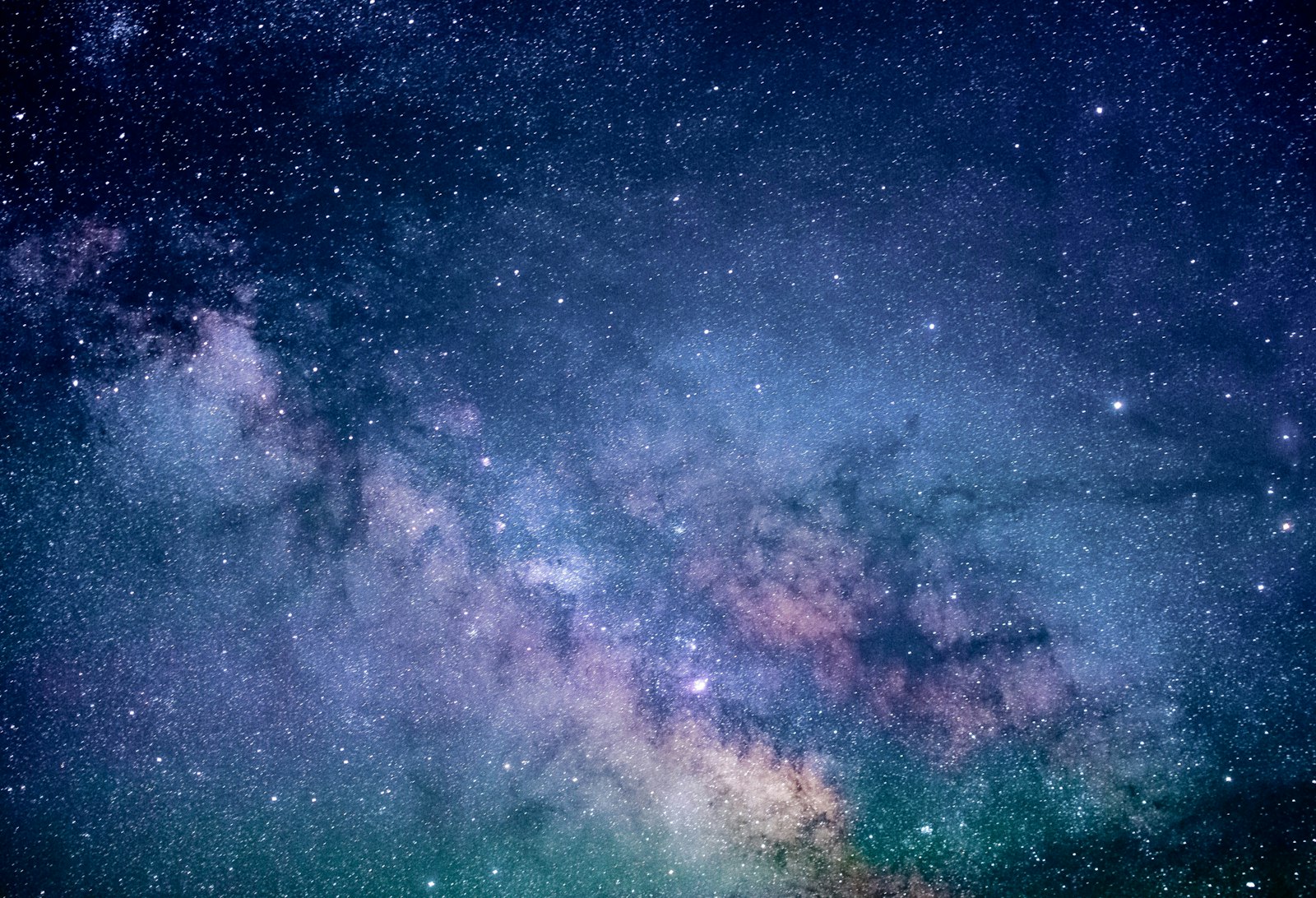 Large satellite dishes pointed at the night sky