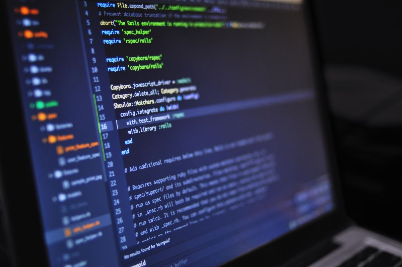 Close-up of programming code on a laptop screen