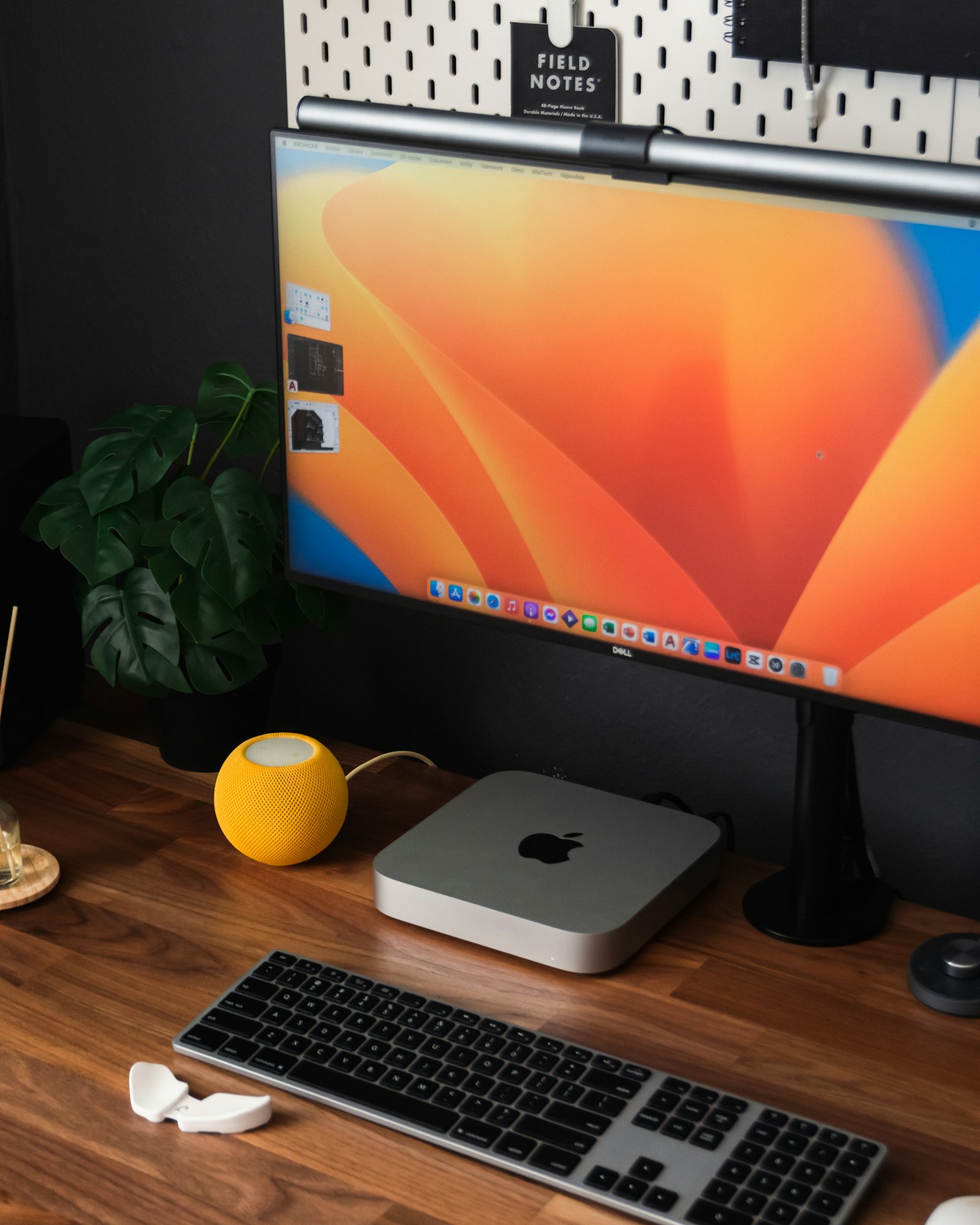 Desktop computer sitting on a wooden desk in a home office
