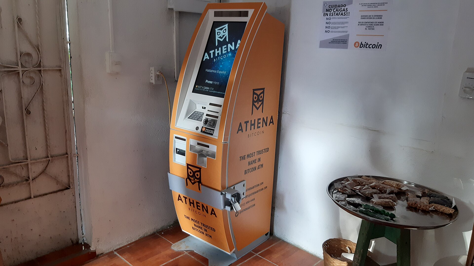 Orange Bitcoin ATM inside a small shop in El Zonte, El Salvador