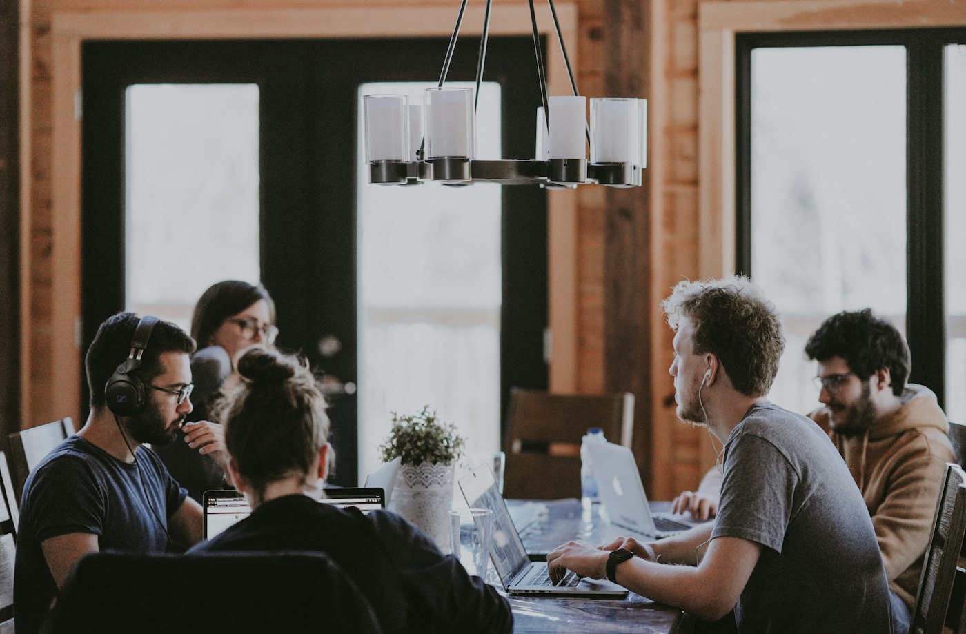 Team collaborating around a table in a bright office
